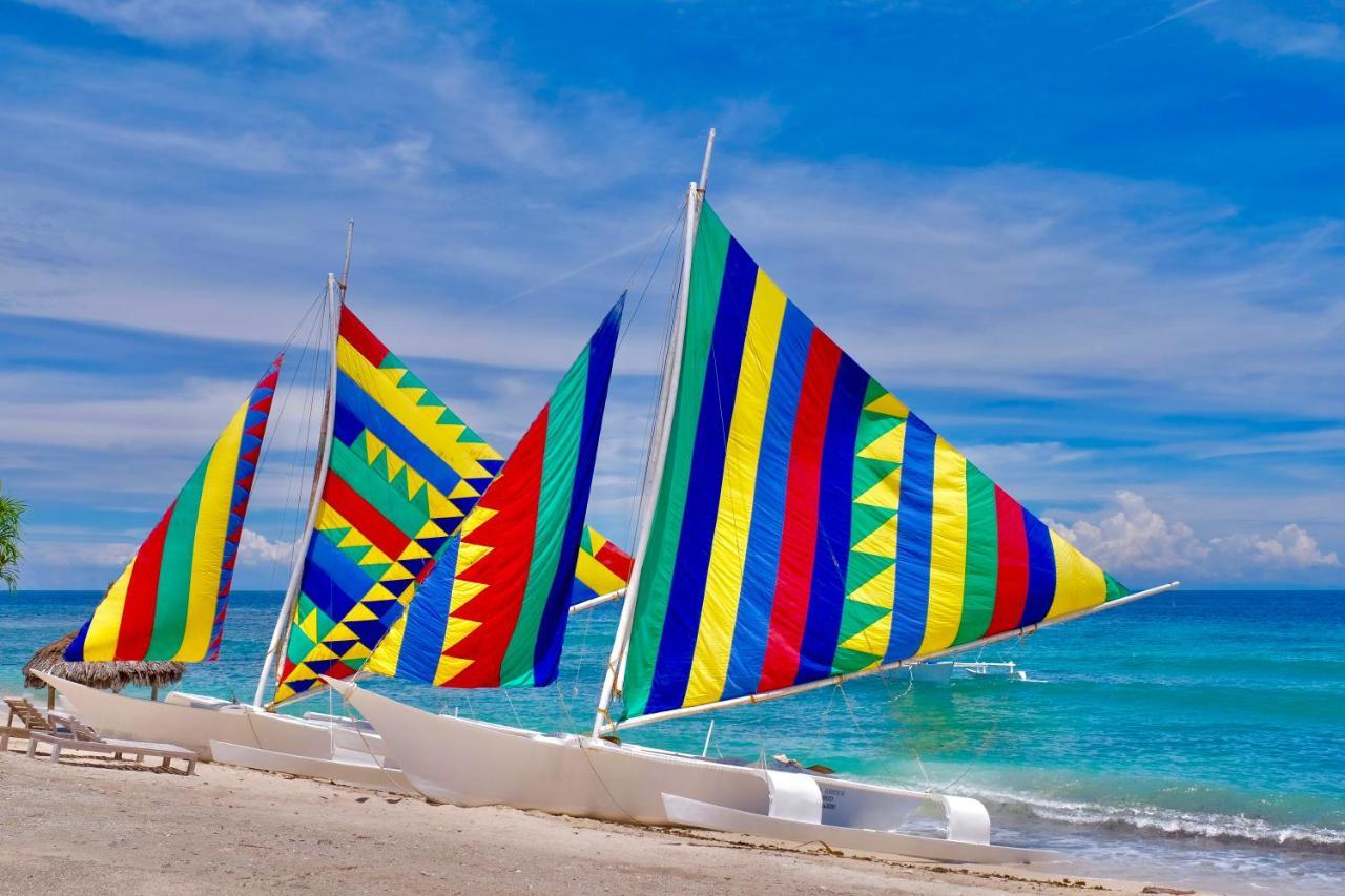 锡基霍尔岛可可林海滩度假村 外观 照片 A Paraw at Calaguas Island, Quezon, Philippines